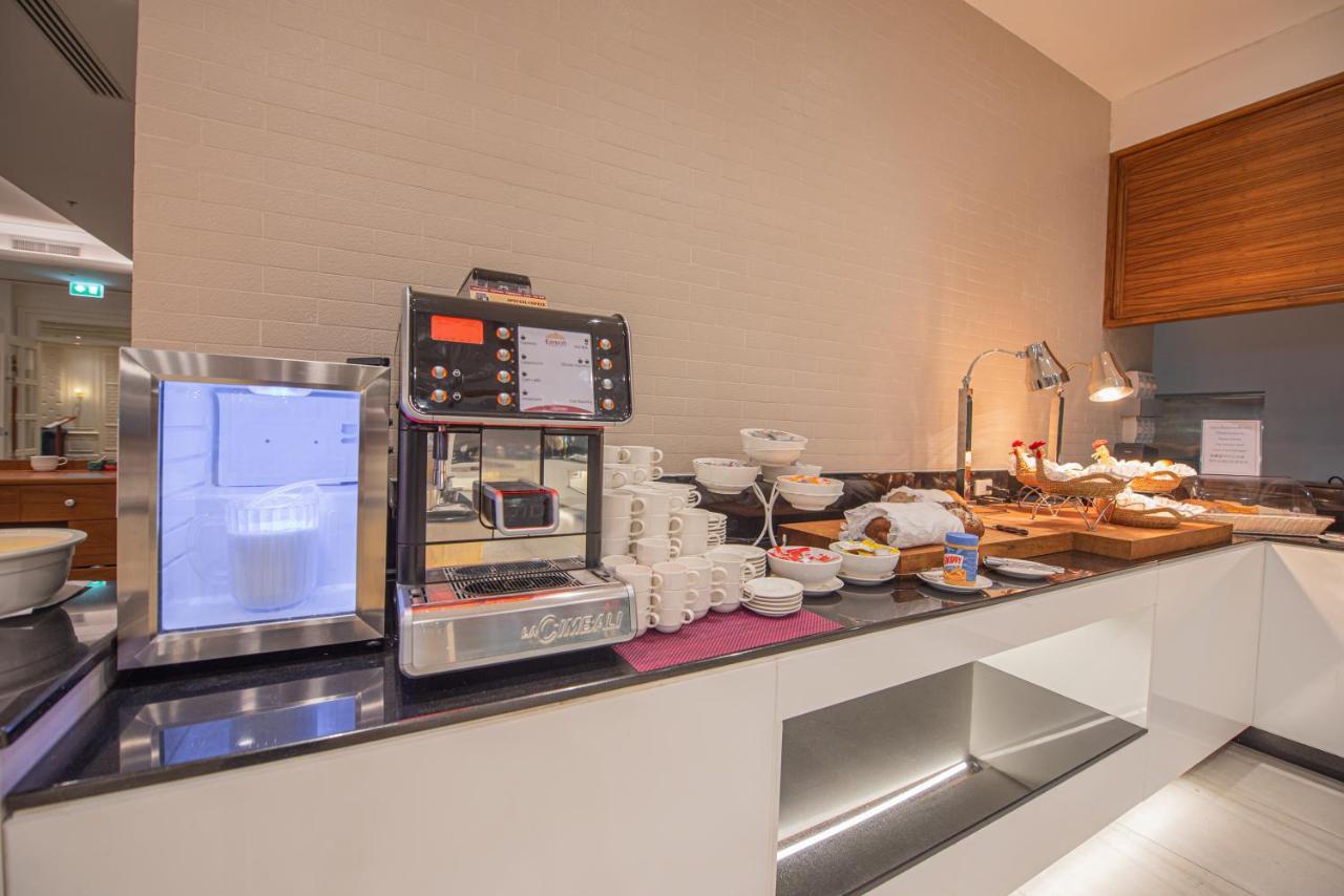The Empress Premier Chiang Mai - Sha Extra Plus Bagian luar foto A coffee machine in a hotel